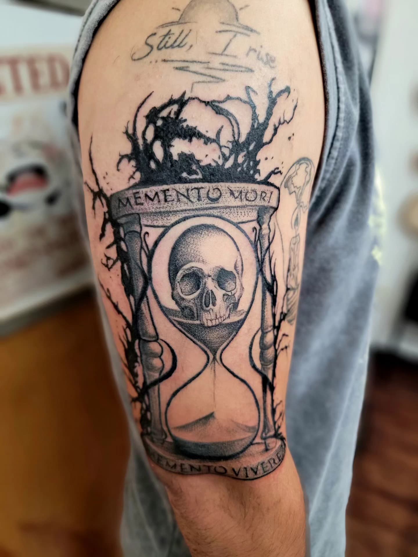 Memento Mori hourglass and skull tattoo