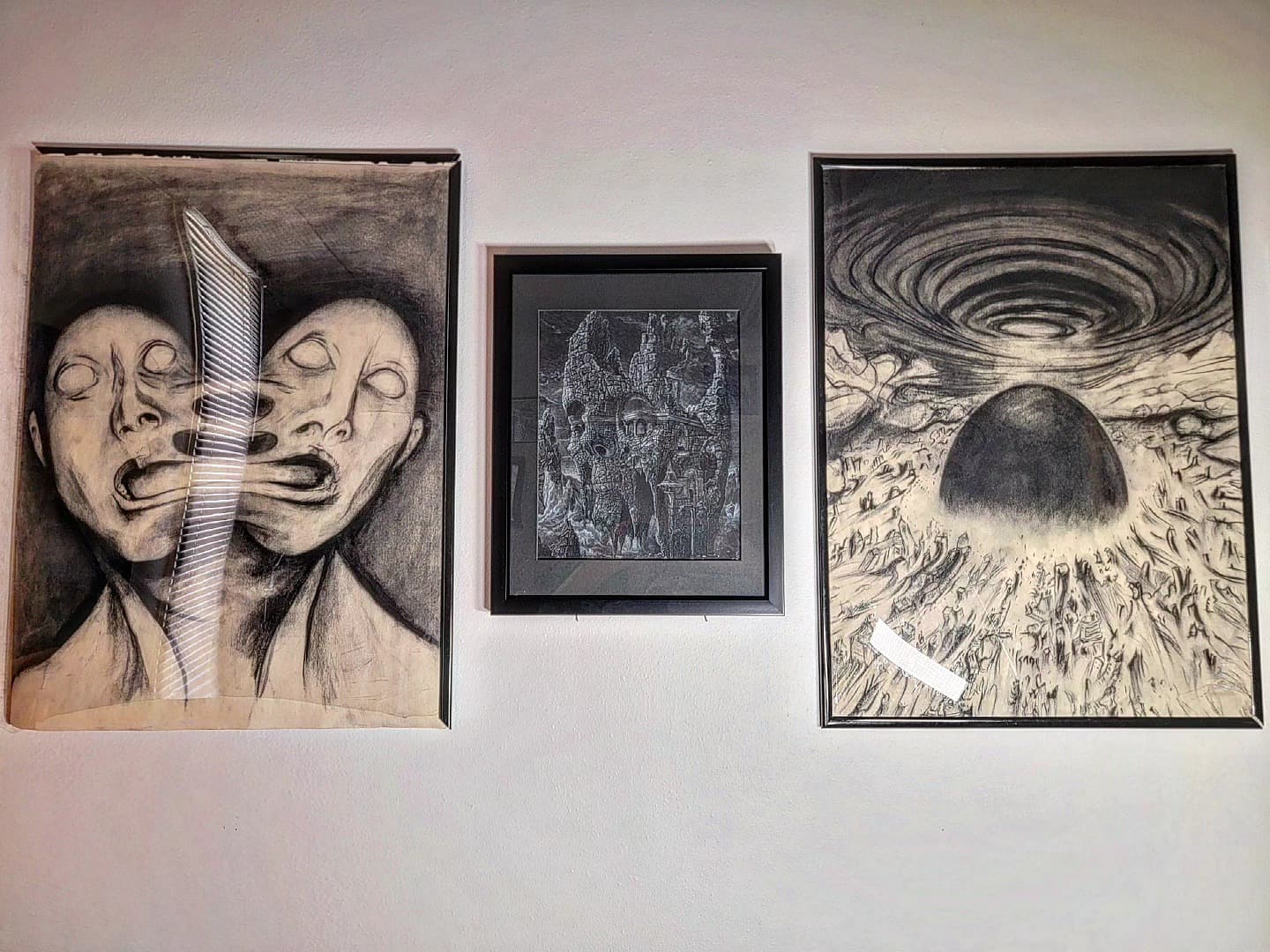 Framed surreal creature designs